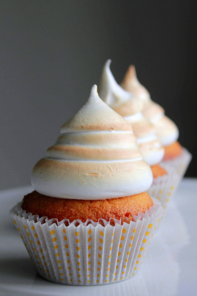 vanilla cupcakes with salted caramel filling and toasted marshmallow frosting